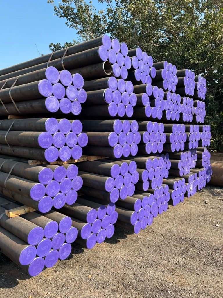 Seamless pipe bundles with purple protective caps
